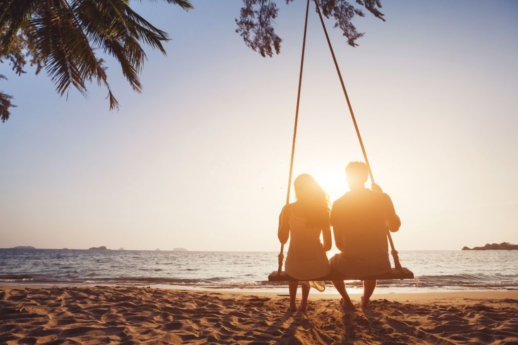 romantic couple in love sitting together