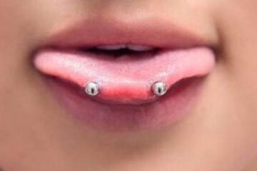 12 Spiritual Meanings of Venom Tongue Piercing